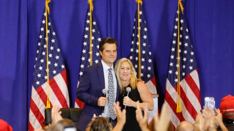 &lsquo;2020 election in one clip&rsquo;: Conservatives jeer as tiny group of protesters heckles MASSIVE crowd at Florida rally of Trump allies