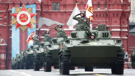 Russian service members drive BMD-4M infantry fighting vehicles during a military parade on Victory Day, which marks the 76th anniversary of the victory over Nazi Germany in World War Two, in Red Square in central Moscow, Russia May 9, 2021.