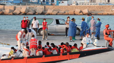 FILE PHOTO. Rescued migrants pictured at the Italian port of Lampedusa.