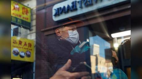 A man is shown riding a city bus in San Francisco's Chinatown area. Asians have been victimized in several attacks on the city's bus system in just the past week.