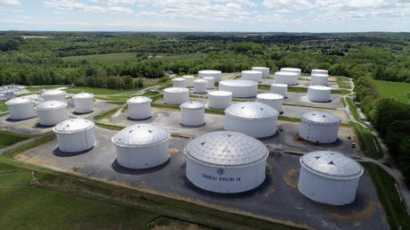 FILE PHOTO: Holding tanks are seen in an aerial photograph at Colonial Pipeline's Dorsey Junction Station in Woodbine, Maryland, US.