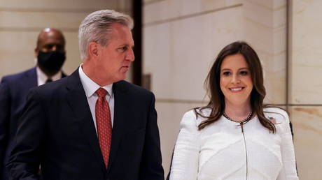 House Minority Leader Kevin McCarthy (R-CA) walks with Rep. Elise Stefanik (R-NY) after Republican caucus speaks to media