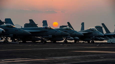 Fighter jets on the flight deck of United States Navy aircraft carrier USS Dwight D. Eisenhower on April 3, 2021.