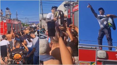 Newly-crowned UFC champ Oliveira receives hero&rsquo;s welcome by favela community in Brazil after stunning title win (VIDEO)