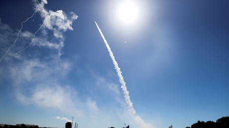 Israel's Iron Dome anti-missile system fires to intercept a rocket launched from the Gaza Strip towards Israel