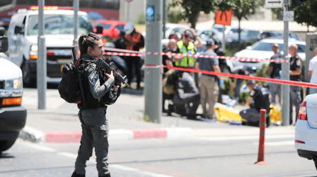 An Israeli security force member stands guard at the scene of an incident in Jerusalem May 24, 2021. © REUTERS/Ammar Awad