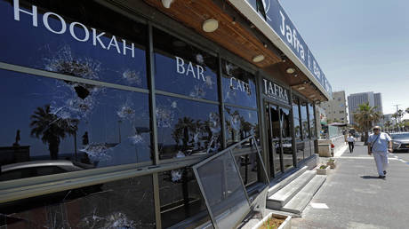 A vandalized Arab restaurant after clashes in the Israeli town of Bat Yam on May 12. © AFP / Gil Cohen-Magen