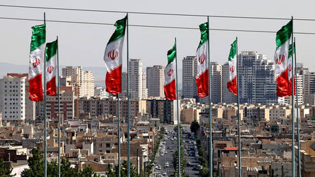 FILE PHOTO. Iranian national flags flutter in the capital Tehran.