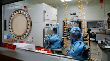 FILE PHOTO: Personnel are working inside the bio-level 4 research lab in Fort Detrick, Maryland