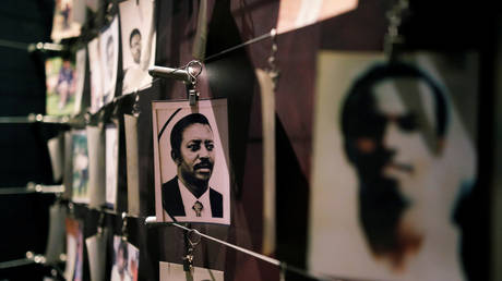 Pictures of the Rwandan Genocide victims donated by survivors are displayed at an exhibition at the Genocide Memorial in Gisozi in Kigali, Rwanda (FILE PHOTO) © REUTERS/Baz Ratner