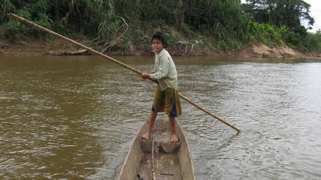 A Tsimane child in a canoe. © Chapman University