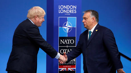 FILE PHOTO: UK Prime Minister Boris Johnson (L) and Hungarian Prime Minister Viktor Orban at an event in Watford, UK, 2019. © Christian Hartmann / AFP