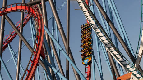 Riders get trapped on Texas roller coaster for hours after sudden stop at sharp angle (VIDEO)