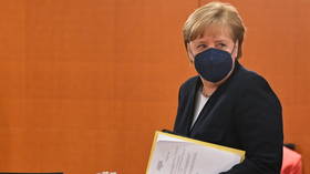 Merkel opposes Biden’s call to waive Covid-19 vaccine patent protections, as Spain says proposal ‘not enough’