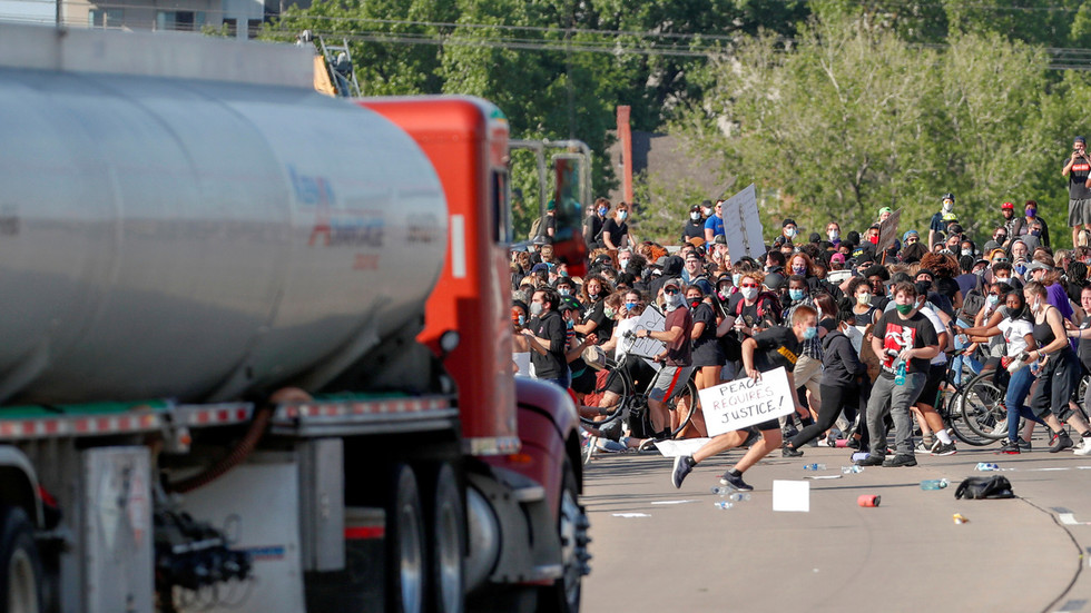 Charges against trucker who drove through BLM protest to be dropped – report