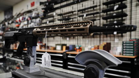 An "FU" custom upper receiver for an AR-15 style rifle is displayed for sale at Firearms Unknown, a gun store in Oceanside, California, U.S., April 12, 2021. © REUTERS/Bing Guan