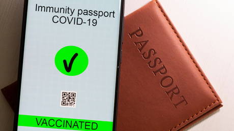 Texas becomes latest state to ban Covid vaccine passports after Gov. Abbott signs bill