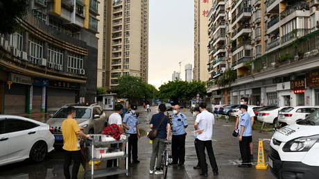 China administers 800mn vaccines in fight against Covid-19 as cases spike in Guangzhou