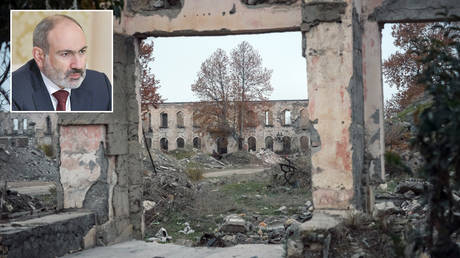 Destroyed buildings in the city of Aghdam. © Sputnik / Alexey Kudenko; (inset) Nikol Pashinyan © Sputnik / Alexander Astafyev / Pool via REUTERS