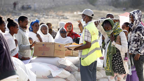 Tigray people in northern Ethiopia, receive the food aid distributed by United States Agency for International Development