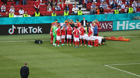 Eriksen received urgent treatment after falling to the pitch. © Reuters