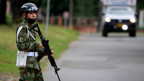 A soldier patrols around a military battalion where a car bomb exploded, according to authorities, in Cucuta, Colombia, June 15, 2021.