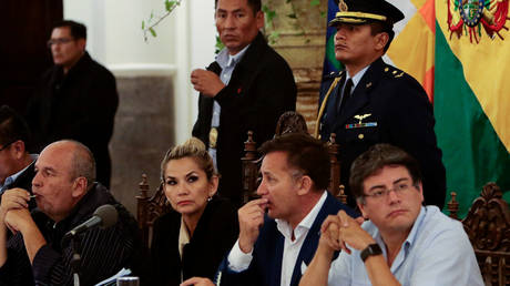 FILE PHOTO: Arturo Murillo, Minister of government, Bolivia's President Jeanine Anez, Minister of Defense Luis Fernando Lopez and Presidency minister Jerjes Justiniano attend a meeting at the presidential palace in La Paz, Bolivia, November 23, 2019. REUTERS/Manuel Claure
