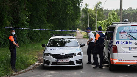 Belgian police at the site where a body, thought to be the one of missing rogue soldier Jurgen Conings, was found. © AFP / John Thys