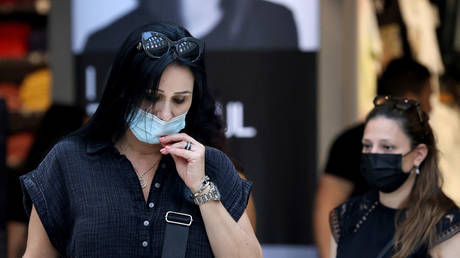 Israeli women wear protective masks against Covid-19 in Jerusalem on June 25, 2021. © Emmanuel DUNAND / AFP