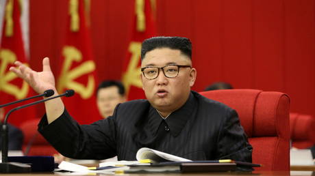 North Korean leader Kim Jong Un speaks during the opening of the 3rd Plenary Meeting of the 8th Central Committee of the Workers' Party of Korea (WPK), in Pyongyang, North Korea, in this undated photo released on June 16, 2021. © Reuters / KCNA