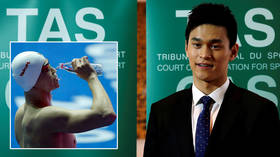 Three-time Olympic champ banned for 4 years over blood test, retrial rules after original chair was seen to show anti-Chinese bias