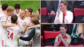 No.1 fan: Delighted Danish PM Frederiksen ditches blazer to celebrate in team strip as they drub Wales in Euro 2020 clash (VIDEO)