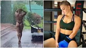 Thunderstruck: Russian former UFC siren Aleksandra Albu flaunts curves in middle of storm (VIDEO)