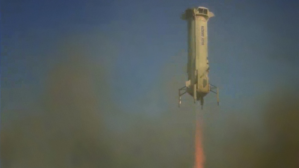 Bezos lands in west Texas desert after successful space flight