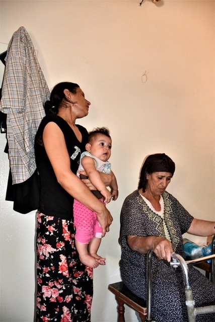 A mother with her baby and the grandmother of three-year-old martyr, Massa Saleh, in Jurin. © Vanessa Beeley