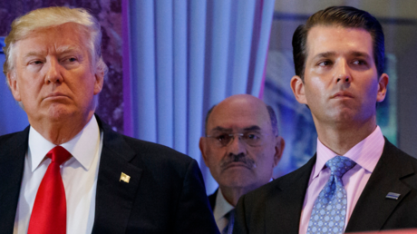 FILE PHOTO. Donald Trump, left, his chief financial officer Allen Weisselberg, center, and his son Donald Trump Jr., right, during a news conference at Trump Tower in New York. © AP Photo/Evan Vucci