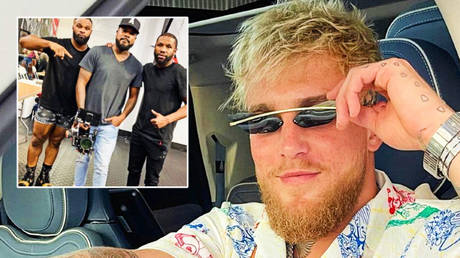 ‘You know who Floyd trained before you, right?’ Jake Paul savagely trolls Mayweather after boxing icon trains with MMA foe Woodley