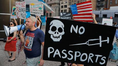 Protesters against vaccine mandates and vaccine passports are shown outside a concert at Madison Square Garden last month in New York City.