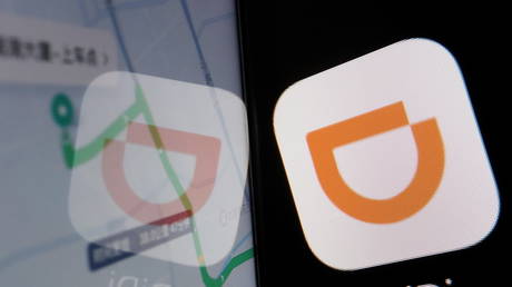 FILE PHOTO: The app logo of Chinese ride-hailing giant Didi reflected on its navigation map.