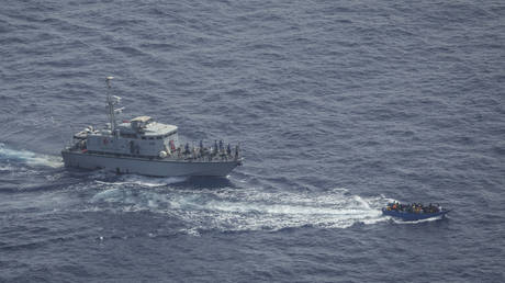 A Libyan Coast Guard vessel seen in pursuit of a migrant boat, June 30, 2021 © Sea Watch