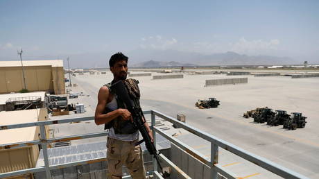 An Afghan soldier stands guard on a security tower in Bagram US air base, after American troops vacated it, in Parwan province, Afghanistan, July 5, 2021 © Reuters / Mohammad Ismail