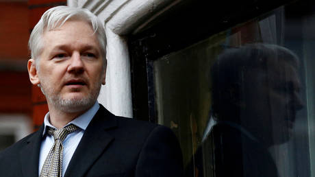 FILE PHOTO: WikiLeaks founder Julian Assange makes a speech from the balcony of the Ecuadorian Embassy, in central London, Britain February 5, 2016.