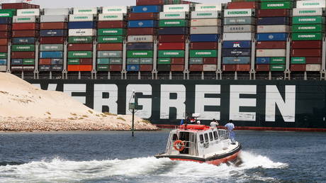 Ever Given, one of the world's largest container ships, sets sail to leave through Suez Canal after the canal authority reached a settlement with the vessel's owner and insurers, in Ismailia, Egypt, July 7, 2021. © REUTERS/Amr Abdallah Dalsh