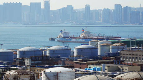 Oil tanks at the China National Petroleum Corporation (CNPC)'s Dalian Petrochemical Corp in Dalian, Liaoning province, China