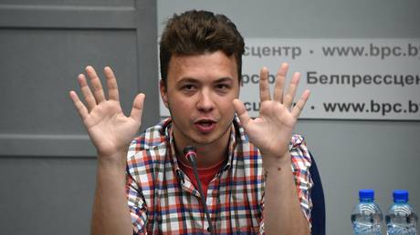 FILE PHOTO. Jailed Belarus journalist Roman Protasevich speaks during a news conference in Minsk, Belarus. June 14, 2021