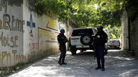Police stand guard near the private residence of Haiti's President Jovenel Moise after he was shot dead by gunmen, in Port-au-Prince, Haiti, July 7, 2021.