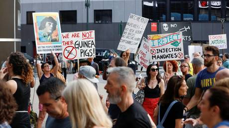 Anti-vaccine protesters are shown outside New York's Madison Square Garden in June.