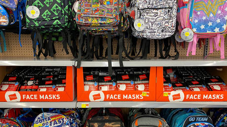 FILE PHOTO: Face masks are shown for sale with back packs and other back to school supplies at a Walmart store in Encinitas, California, July 28, 2020.