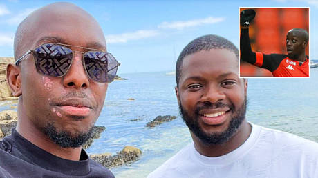 Footballer posts first photo of face after alleged acid attack by woman accused of assaulting new mother and abducting her baby