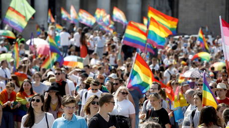 FILE PHOTO: People attend the "Equality Parade" rally in support of the LGBT community, in Warsaw, Poland June 19, 2021. © REUTERS/Kacper Pempel